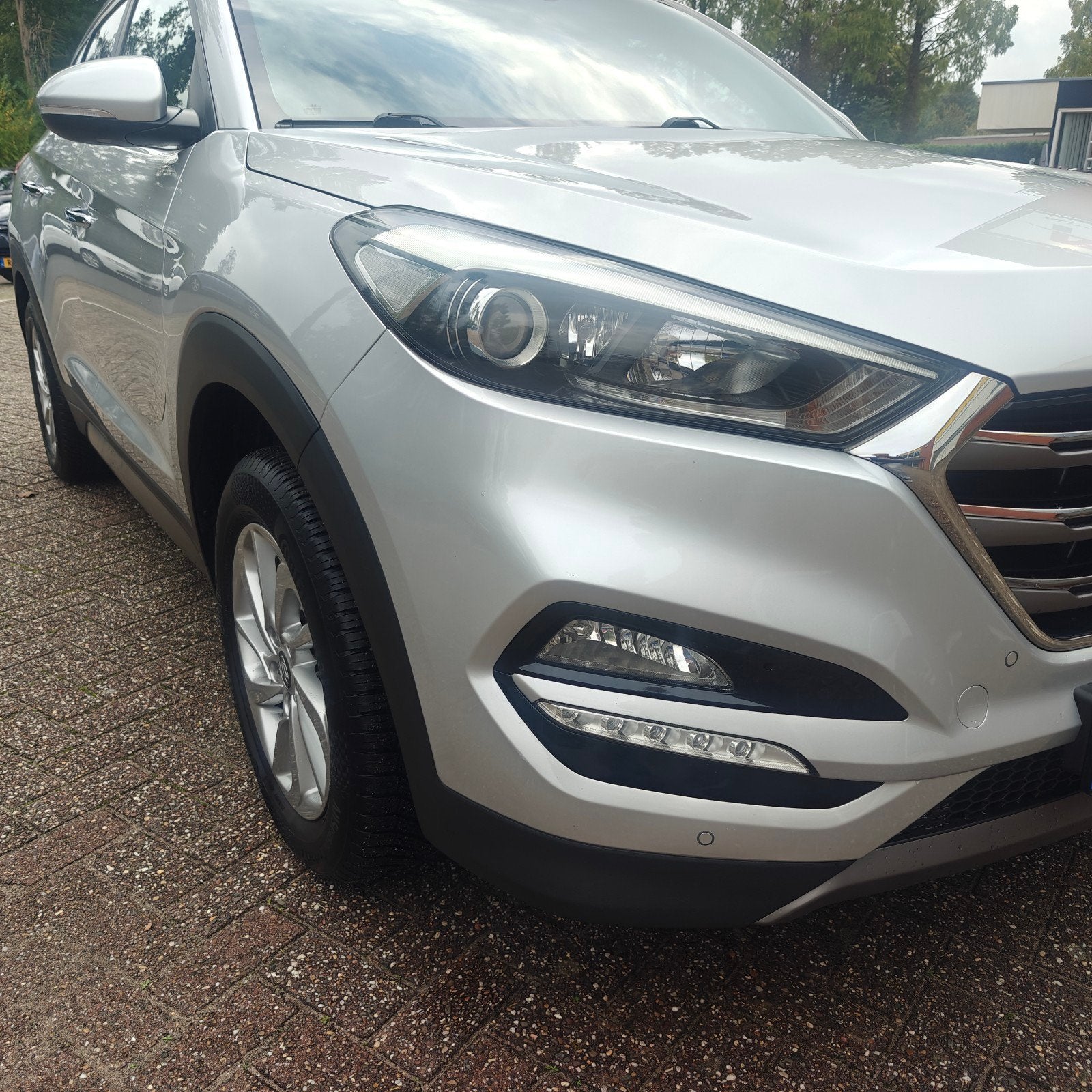 Hyundai Tucson Premium Leder!1.6 GDi 132pk 2016 Grijs, Auto's, Voorwielaandrijving, Bluetooth, 1591 cc, 4 cilinders