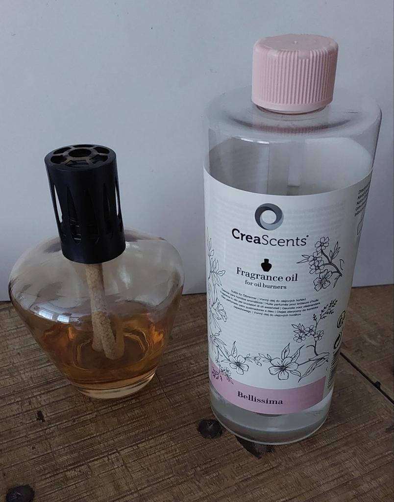 Gratis olielampje + fles olie, Ophalen