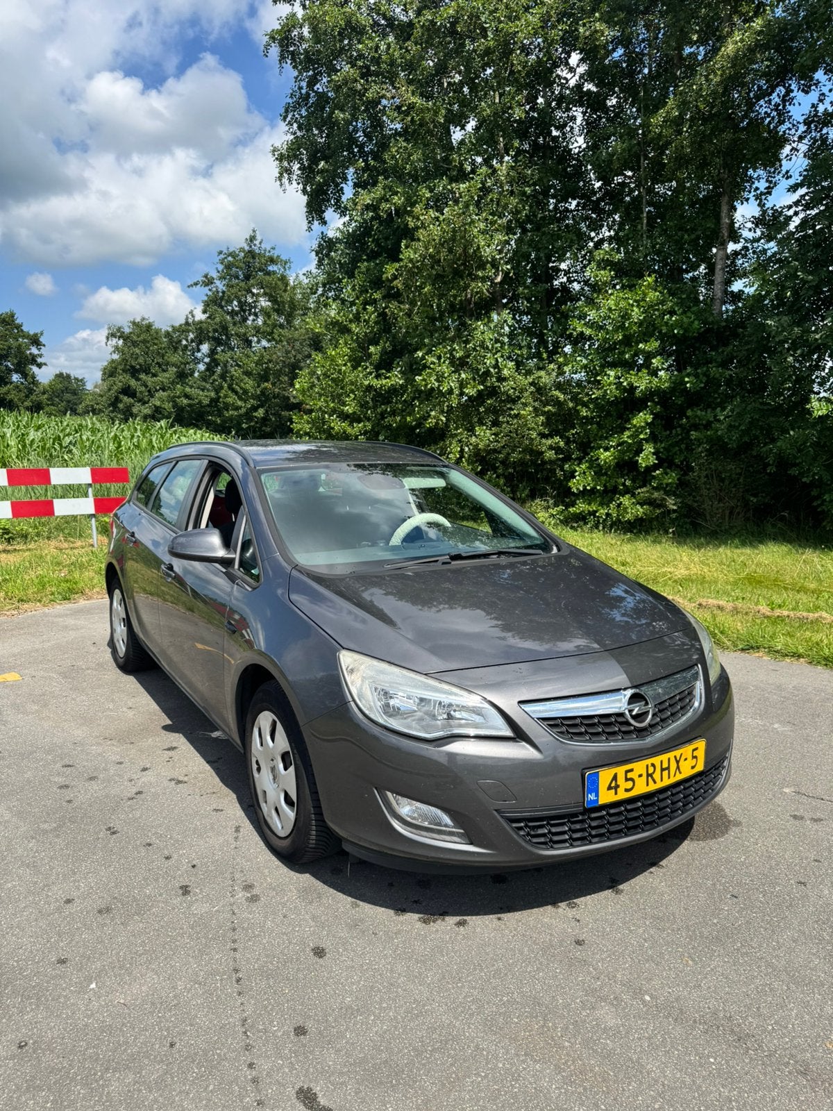 Opel Astra 1.4 74KW ST 2011 Grijs, Auto's, Voorwielaandrijving, 4 cilinders, 100 pk, Origineel Nederlands