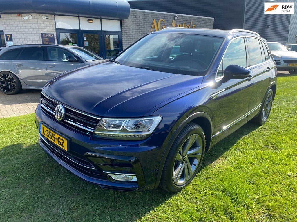 Volkswagen Tiguan 2.0 TSI 4Motion Highline, Auto's, Automaat, Gebruikt, Euro 6, 4 cilinders