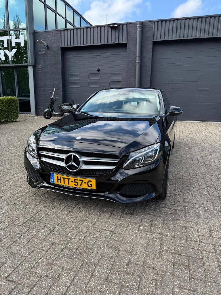Mercedes-Benz C-Klasse C200 2.0 135KW Aut7 2016 Zwart, Auto's, Mercedes-Benz, 1800 kg, 4 cilinders, Zwart, 1365 kg