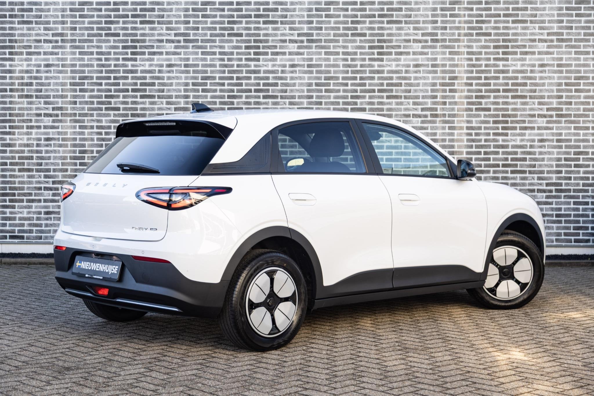 Geely E2 Pro 35 kWh | 252km WLTP | Camera | Park assist voor, Auto's, Stof, Metallic lak, Wit, Elektrisch