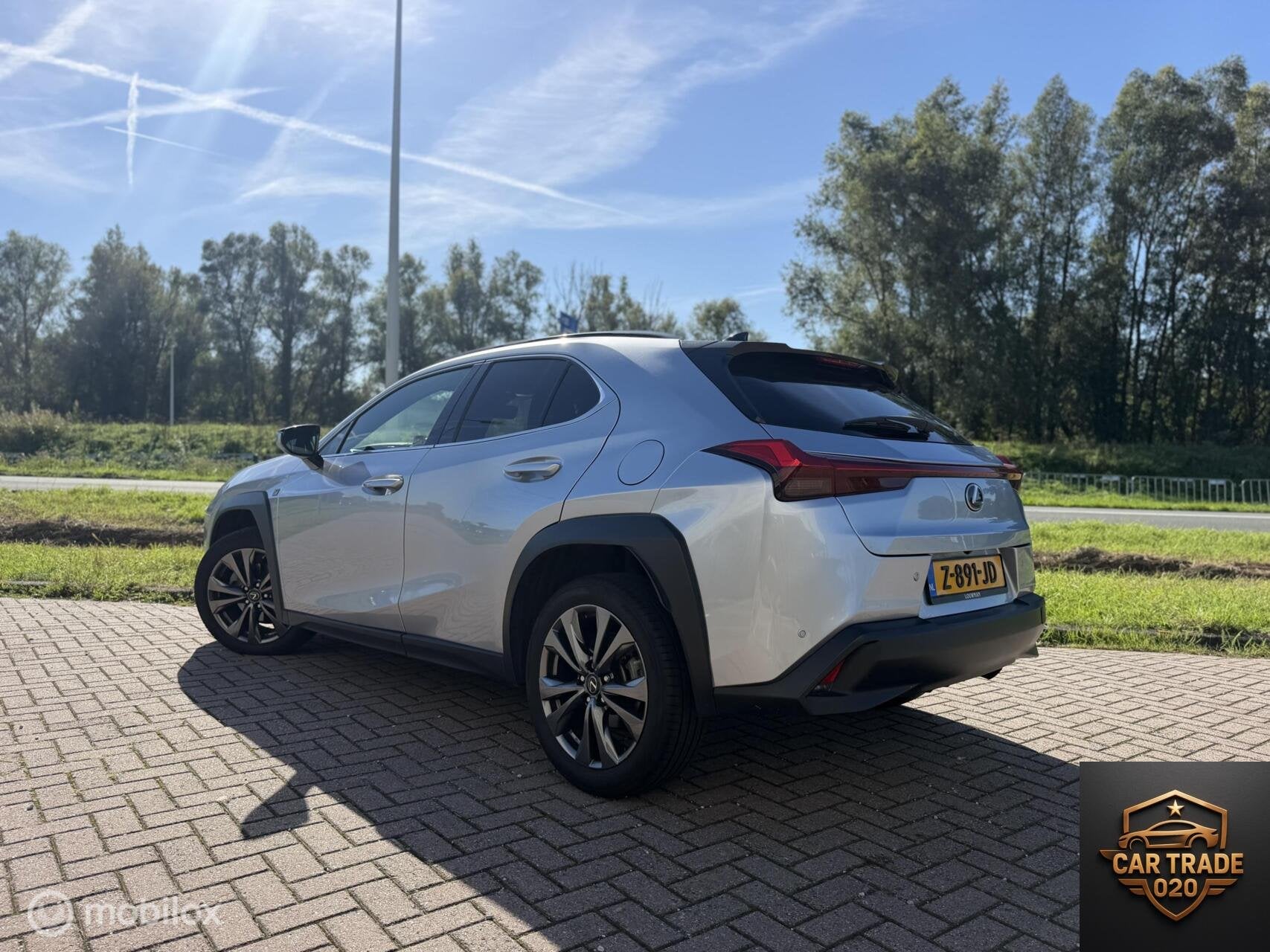 Lexus UX 250h F Sport LEDER|CARPLAY|BLACK PAKKET|, Auto's, Gebruikt, 4 cilinders, Leder, Bedrijf