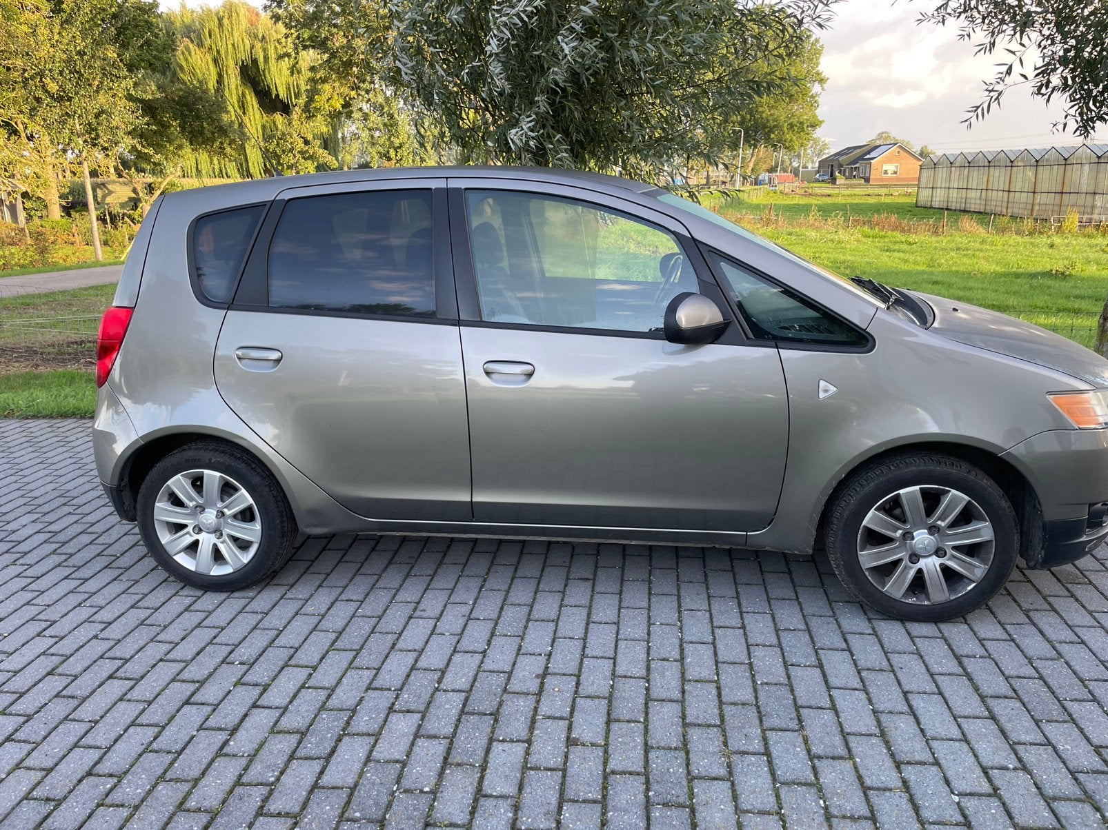 Mitsubishi Colt 1.3 5-DR AUT 2010 Grijs, Euro 5, Stof, 31 €/maand, Colt
