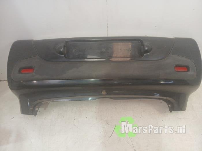 Achterbumper van een Peugeot 107 (EXZ)