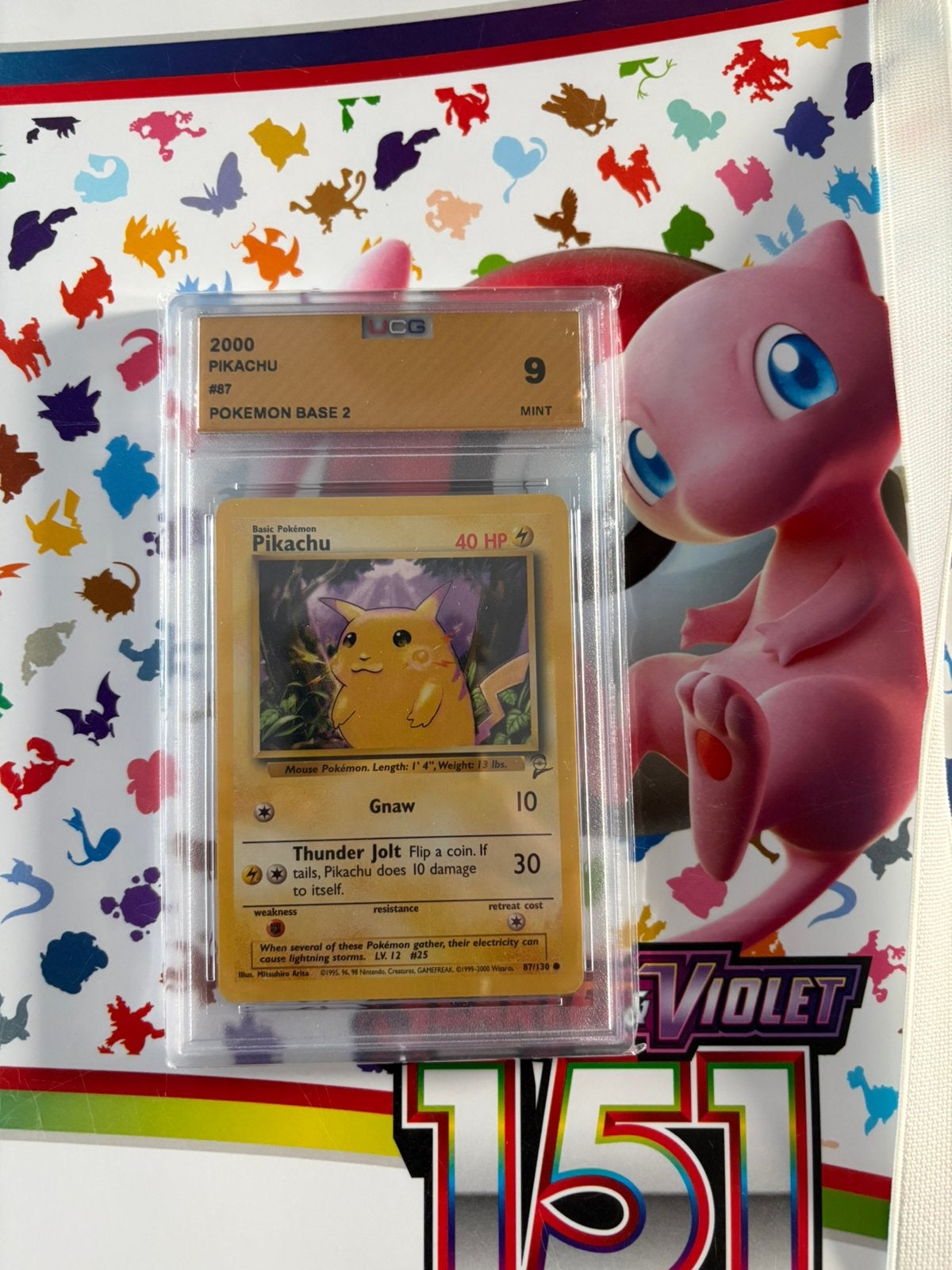 Pikachu base set 2 grade 9, Ophalen of Verzenden, Zo goed als nieuw, Meerdere kaarten, Foil