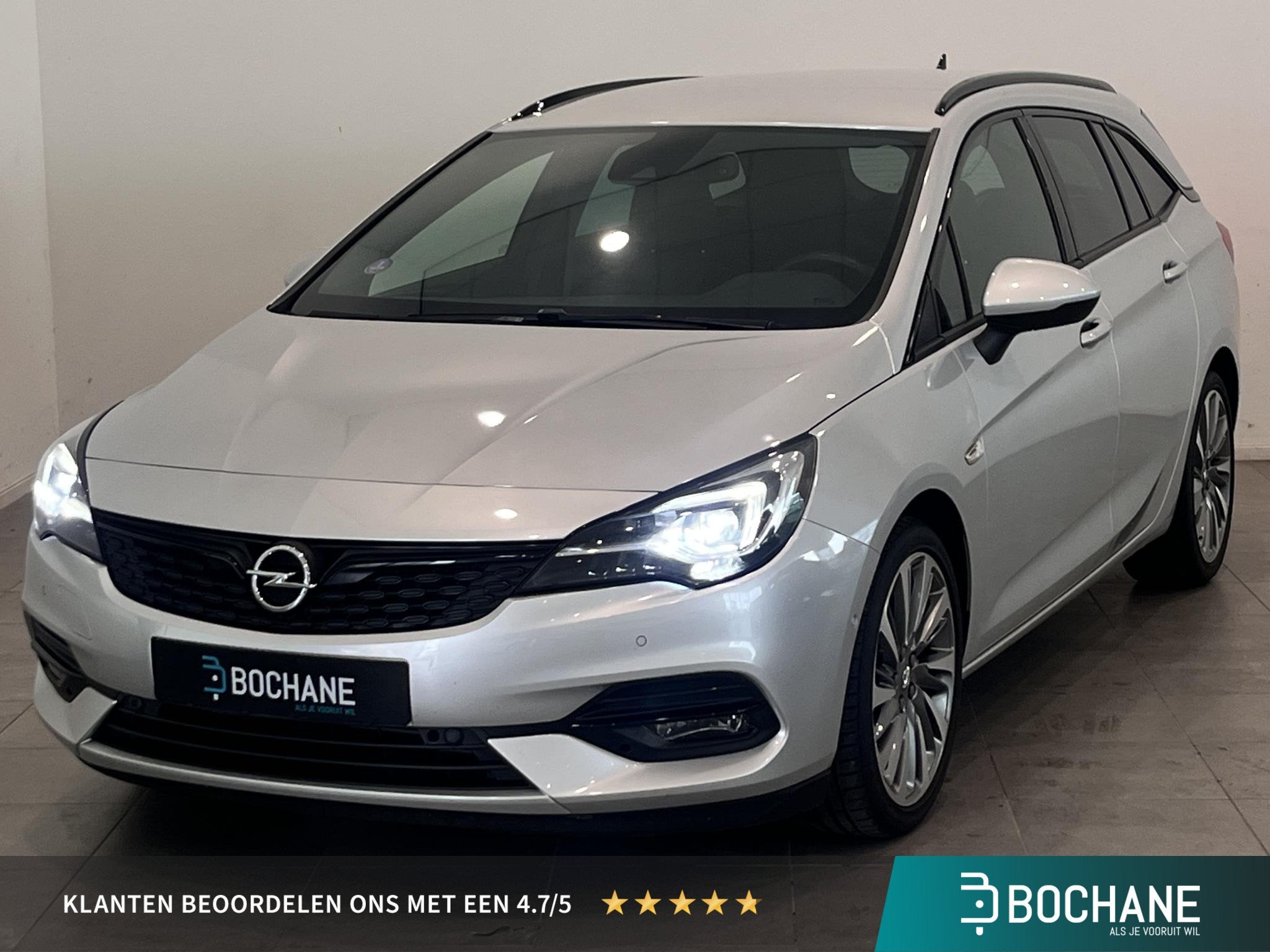 Opel Astra Sports Tourer 1.4 Ultimate | Automaat | Trekhaak, Auto's, Stof, Gebruikt, Met garantie (alle), Origineel Nederlands