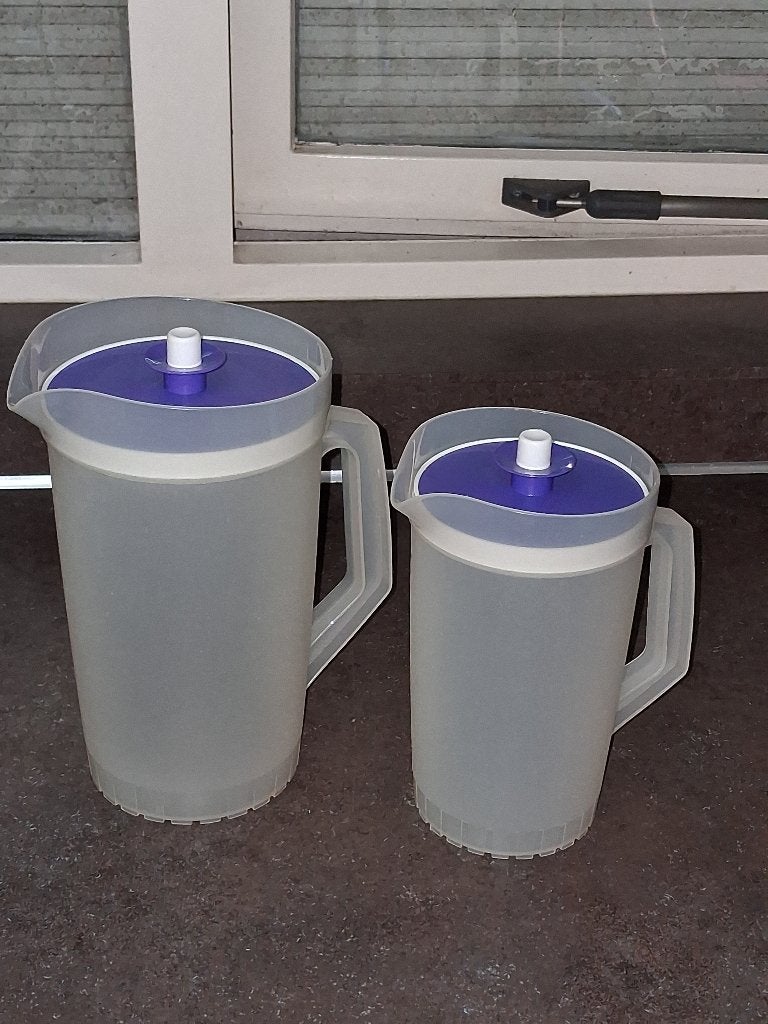 Tupperware sap/schenk kan set nieuwstaat 2 + 1 ltr blauw, Huis en Inrichting, Ophalen of Verzenden, Zo goed als nieuw, Blauw, Overige typen