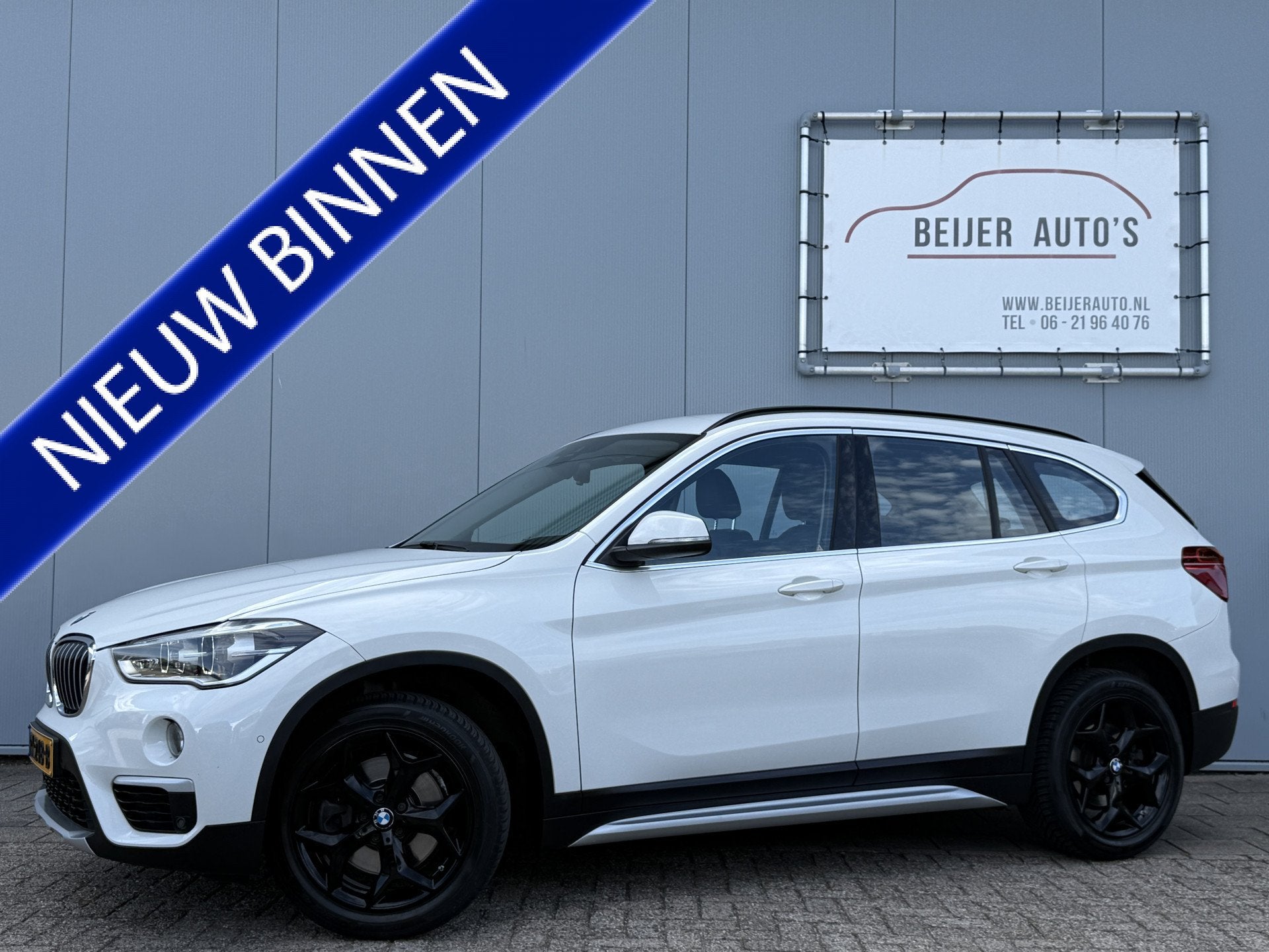 BMW X1 xDrive20i High Executive Automaat Navigatie/Trekhaak/, Auto's, 1998 cc, Gebruikt, Euro 6, 2000 kg