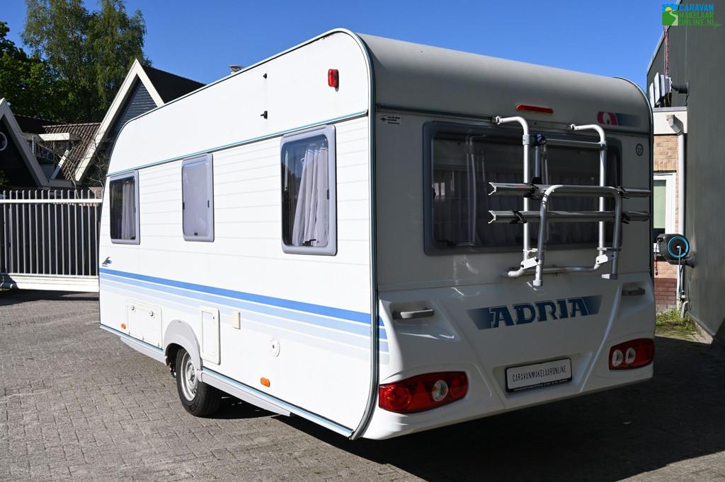 Adria Adora 472 LU |BOVAG|Mover|Zakluifel|Voortent, Caravans en Kamperen, Caravans, Rondzit, Bedrijf, Adria, Kachel