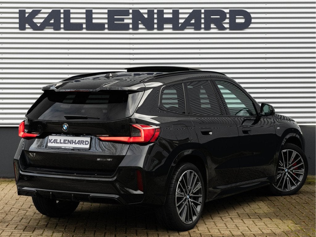 BMW X1 sDrive18i M-Sport Pro - Pano - Memoryzetel - Trekhaak, Auto's, BMW, 136 pk, 24 maanden, Zwart, Leder