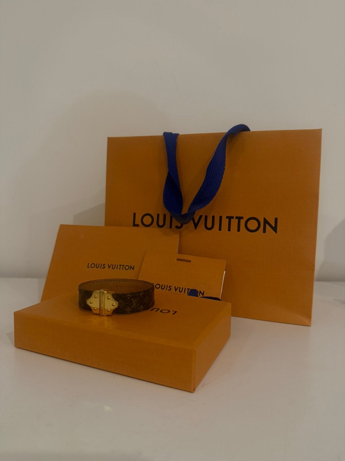 Louis Vuitton armband, Ophalen of Verzenden, Zo goed als nieuw, Bruin, Leer