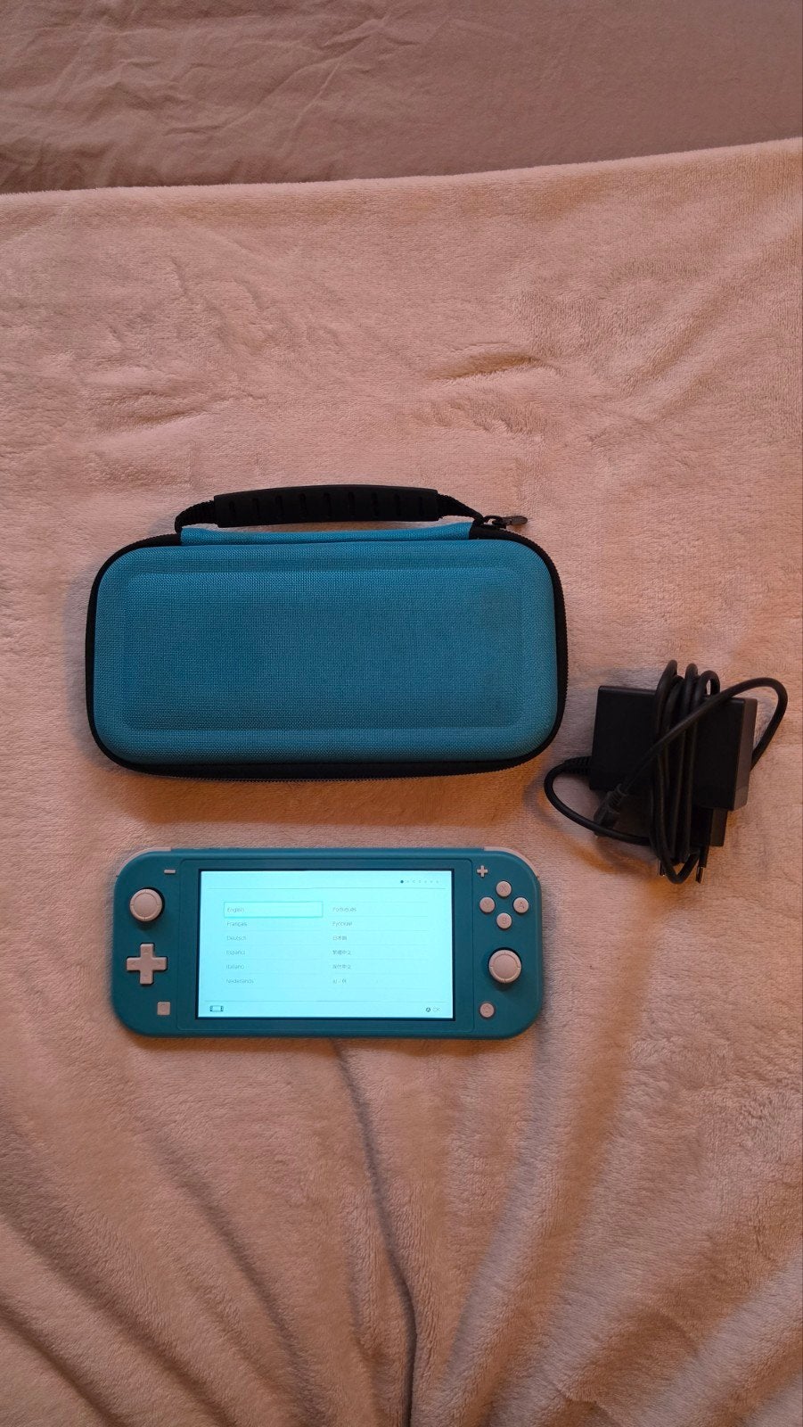 Nintendo Switch Lite Turquoise met oplader en opbergcase, Spelcomputers en Games, Spelcomputers | Nintendo Switch Lite, Ophalen of Verzenden