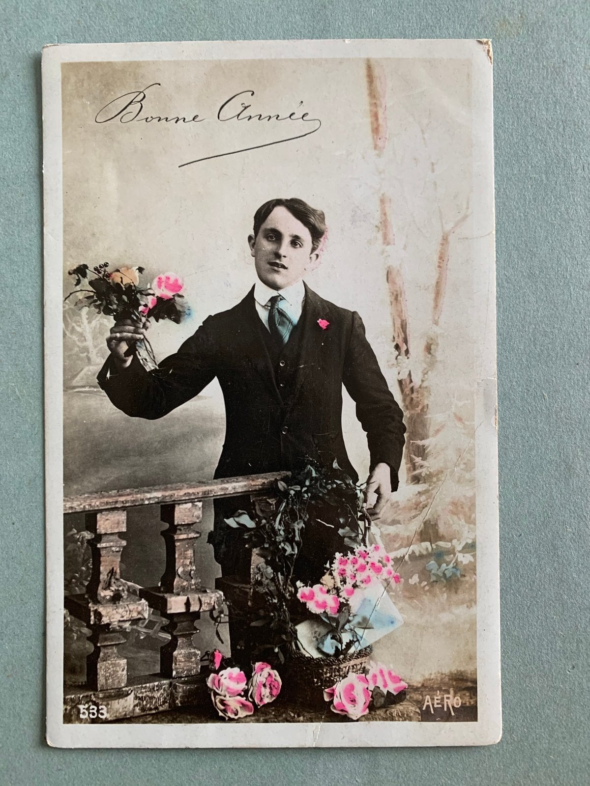 1910 Bonne Année - man met bloemen, Ophalen of Verzenden, Voor 1920, Gelopen, Feest(dag)