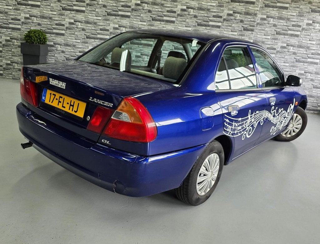 Mitsubishi Lancer 1.3 GLi *Stuurbekrachtiging* 2e eigenaar*!, Auto's, Mitsubishi, Voorwielaandrijving, 970 kg, 4 cilinders, Origineel Nederlands