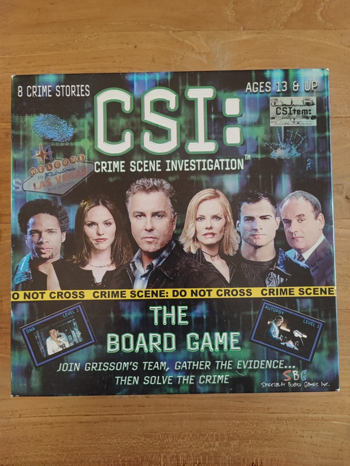 CSI: The Board Game - Crime Scene Investigation, Ophalen of Verzenden, Zo goed als nieuw, Specialty Board Games Inc.