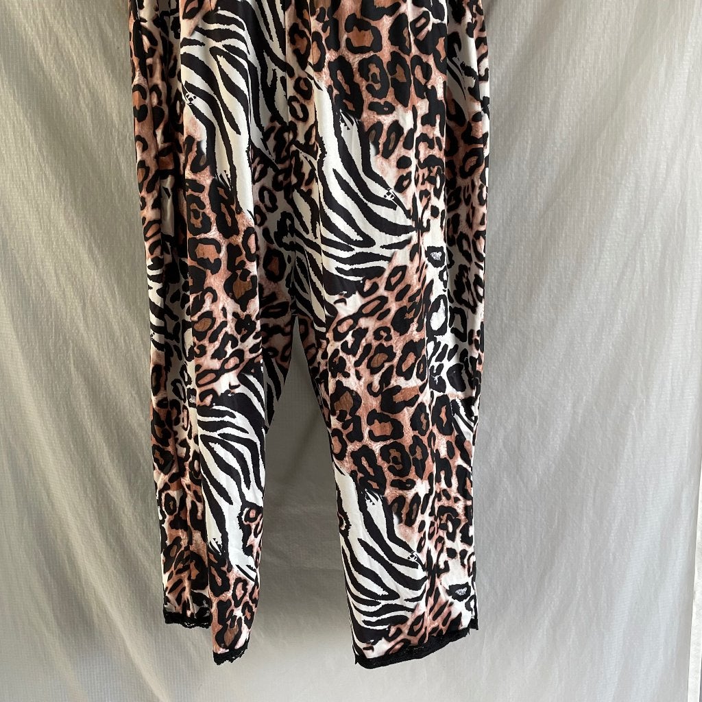 Panterprint jumpsuit 3XL. Zebra / panter met kant, Kleding | Dames, Ophalen of Verzenden, Zo goed als nieuw, Maat 46/48 (XL) of groter