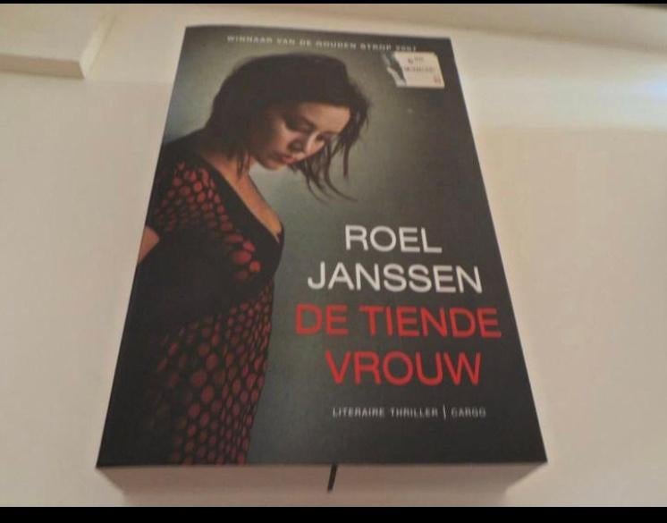 De tiende vrouw - Roel Janssen, Ophalen of Verzenden, Zo goed als nieuw