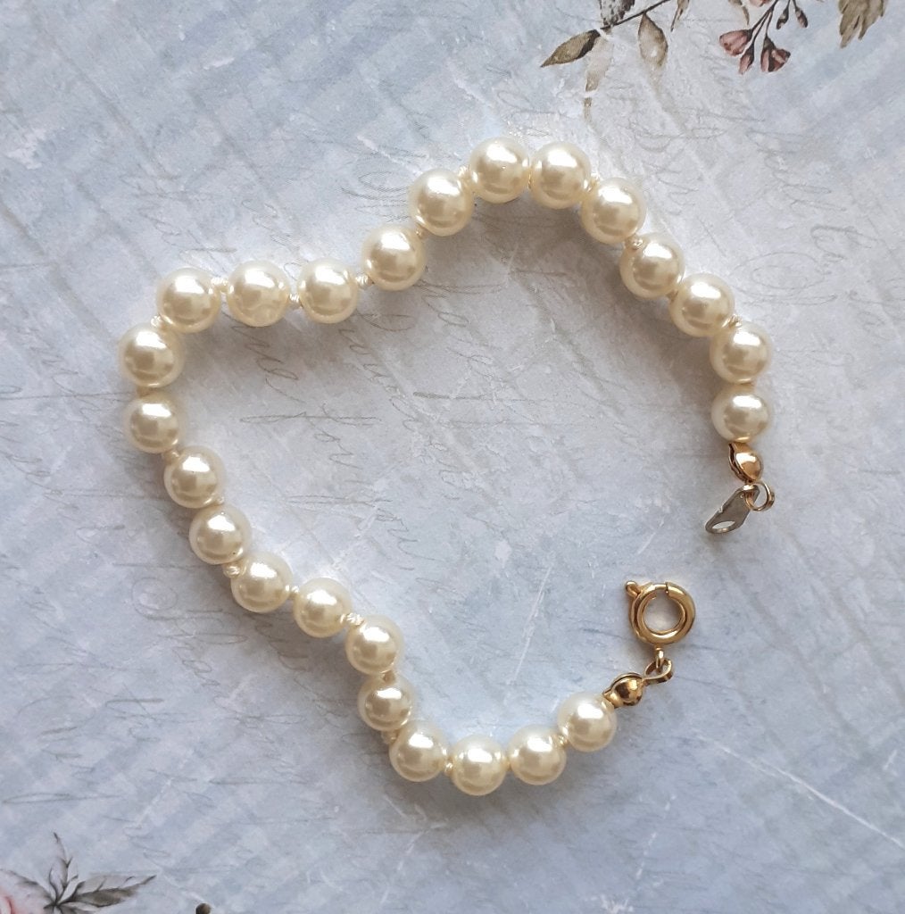parelarmband witte beige parels Coquette, Ophalen of Verzenden, Nieuw, Wit