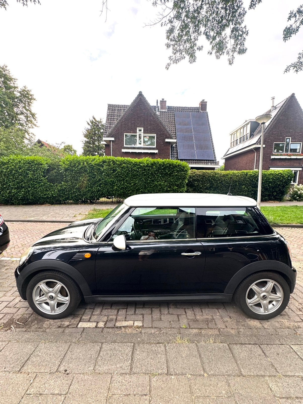 Mini 1.6 Cooper 2007 Zwart apk 03-2027, Auto's, Mini, Voorwielaandrijving, 4 cilinders, 4 stoelen, Leder en Stof