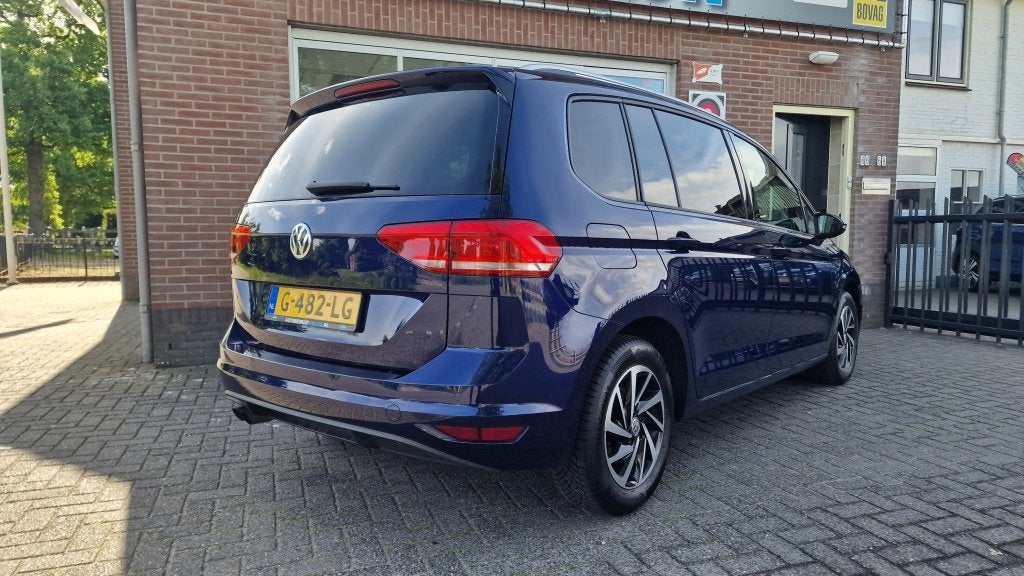 Volkswagen Touran 1.4 TSI Highline 7p, Panorama dak Automaat, Auto's, Stof, Gebruikt, 4 cilinders, 150 pk