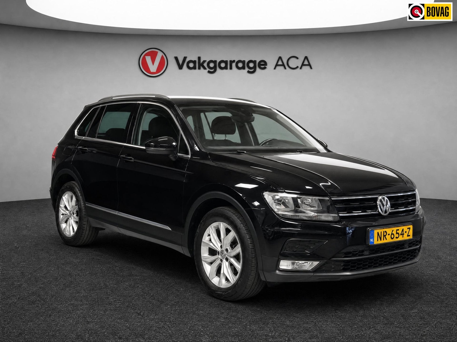 Volkswagen Tiguan 1.4 TSI ACT Comfortline Business // NAVI /, Auto's, 4 cilinders, 150 pk, Zwart, Origineel Nederlands