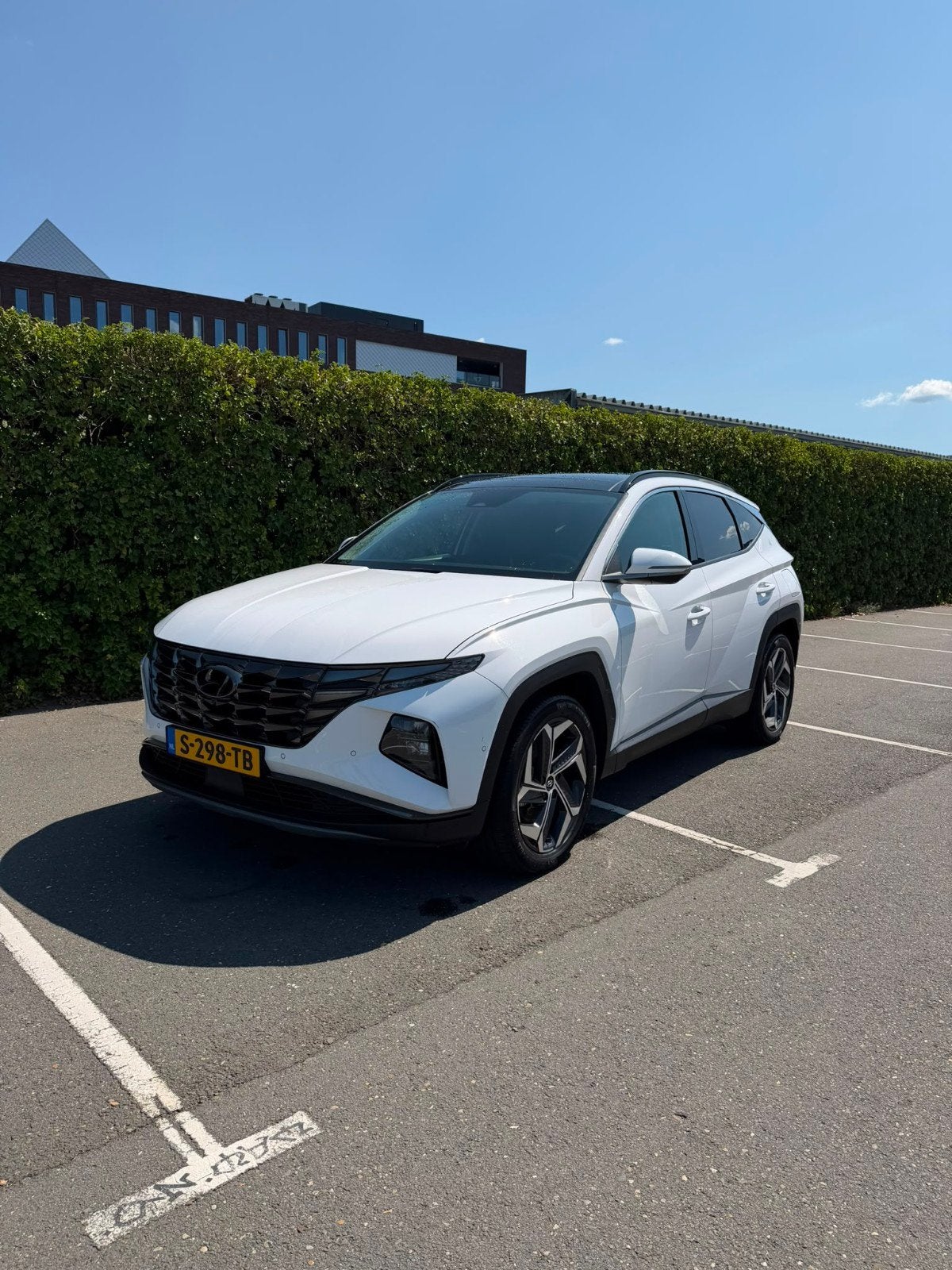 Hyundai Tucson Premium Sky 1.6 T-gdi Phev 265pk AWD Aut. 202, Auto's, Automaat, 1350 kg, 179 pk, Wit