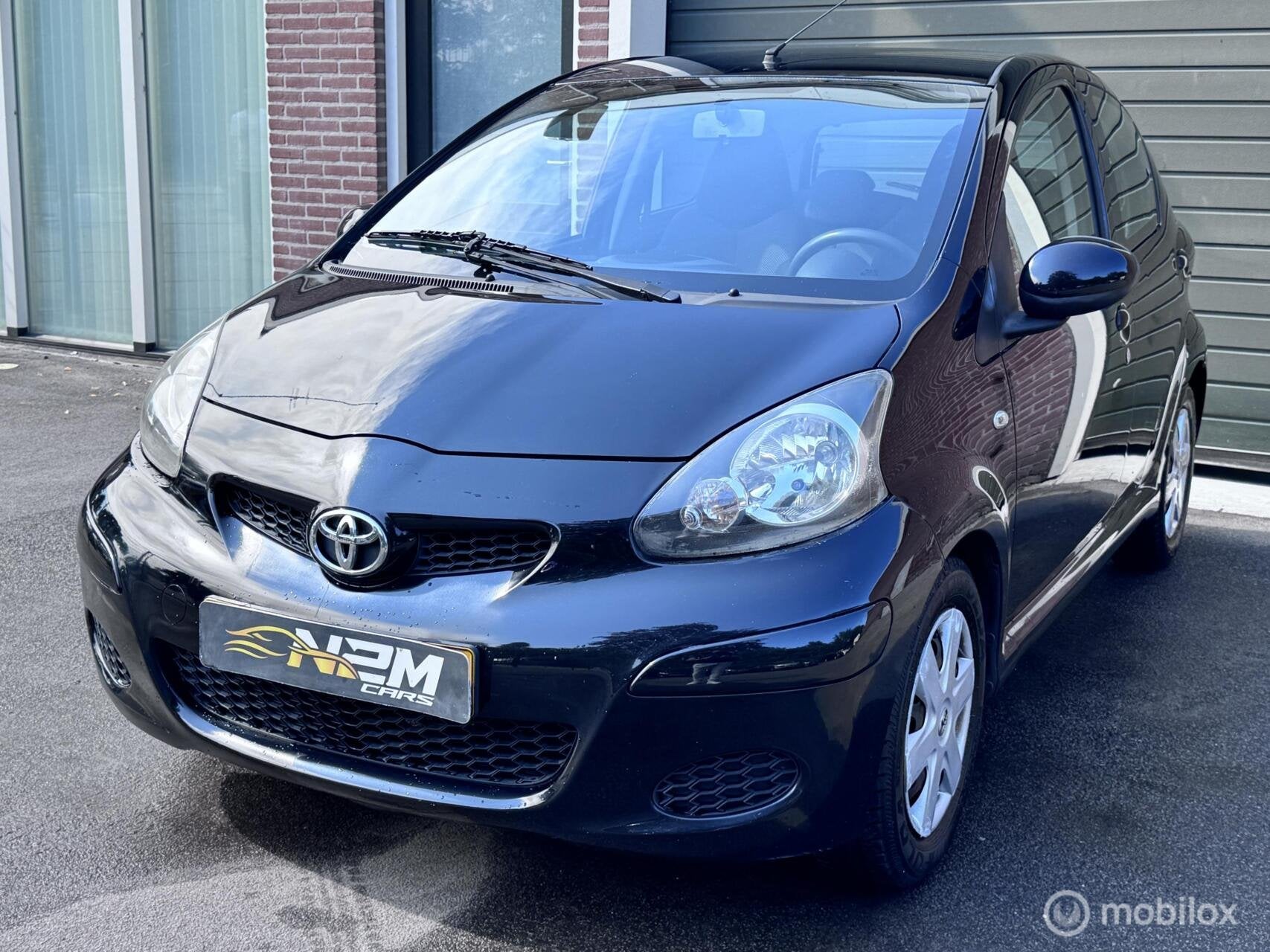 Toyota Aygo 1.0-12V Dynamic Blue - Automaat, Stof, Gebruikt, Zwart, 4 stoelen