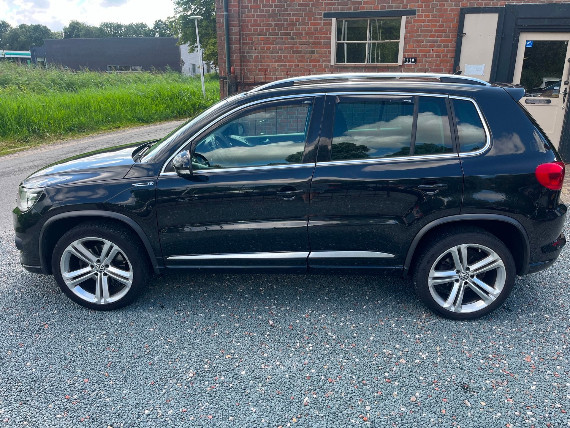 Volkswagen Tiguan 2.0 TSI Sport&Style 4Motion ( Navigatie +, Automaat, Euro 5, Gebruikt, Zwart