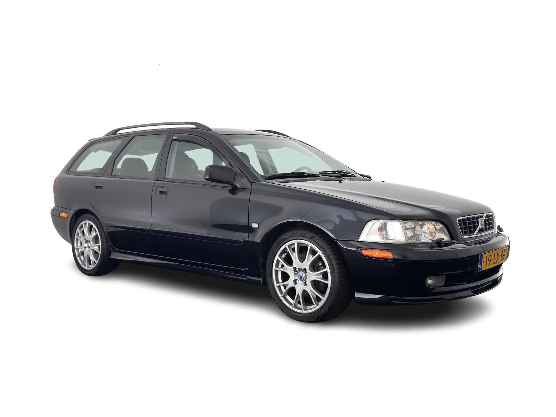Volvo V40 1.8 Europa *LEATHER-FABRIC | HEATED-COMFORTSEATS |, Auto's, Volvo, Gebruikt, Zwart, 4 cilinders, Leder en Stof