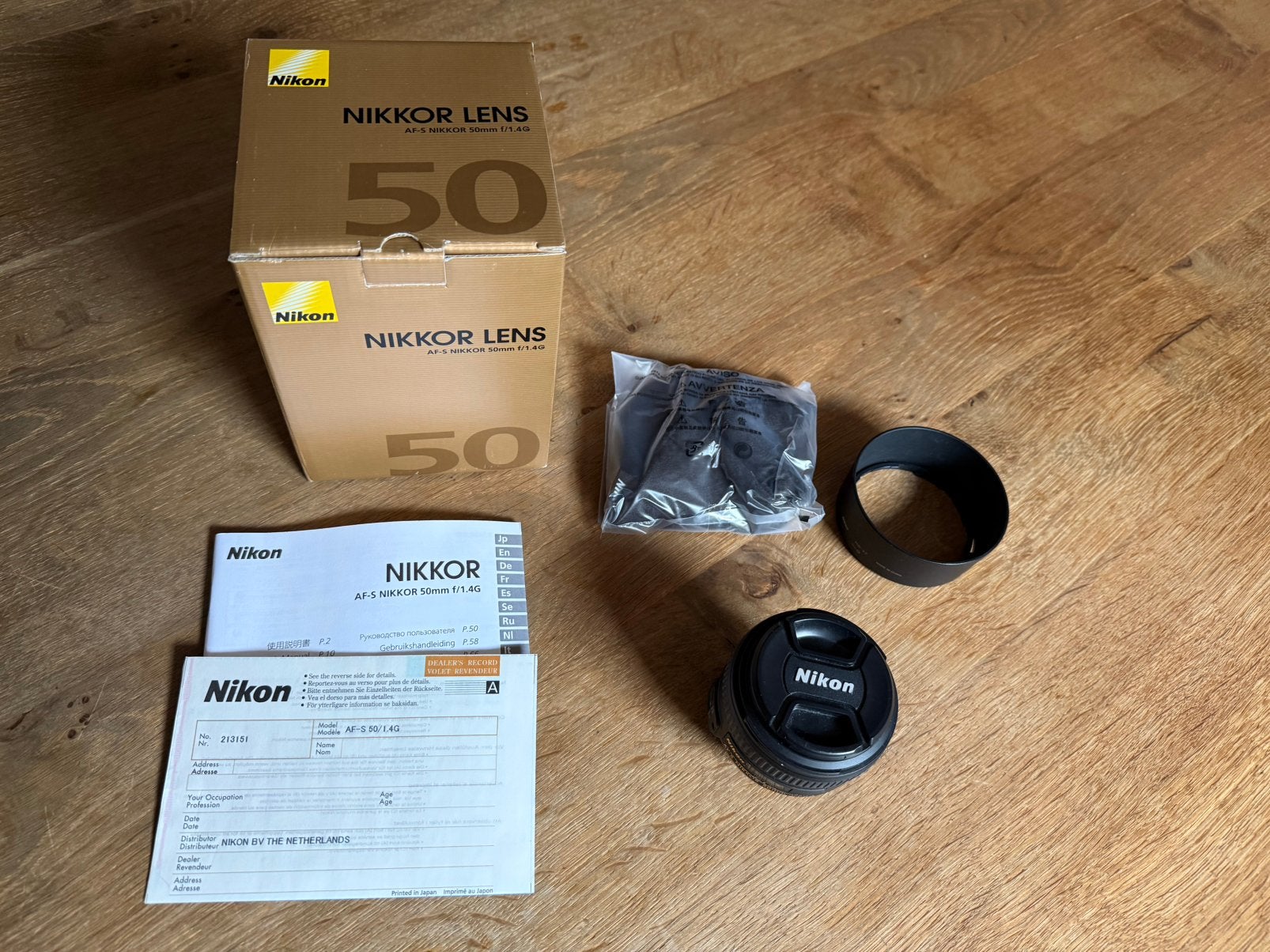 Nikon AF-S Nikkor 50mm f/1.4G + filter, Gebruikt, Nikon, Ophalen of Verzenden, Beschermhoes/tas