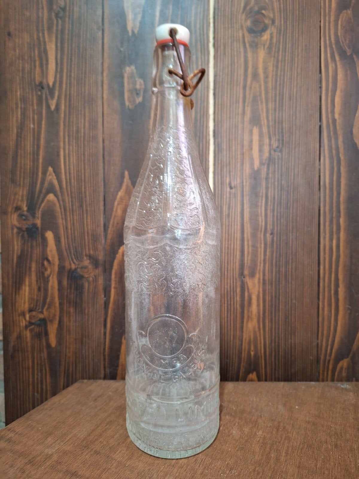 FLES LIMFA LIMONADE GAZEUSE RELIËF, Verzamelen, Ophalen of Verzenden, Gebruikt, Flesje(s), Overige merken