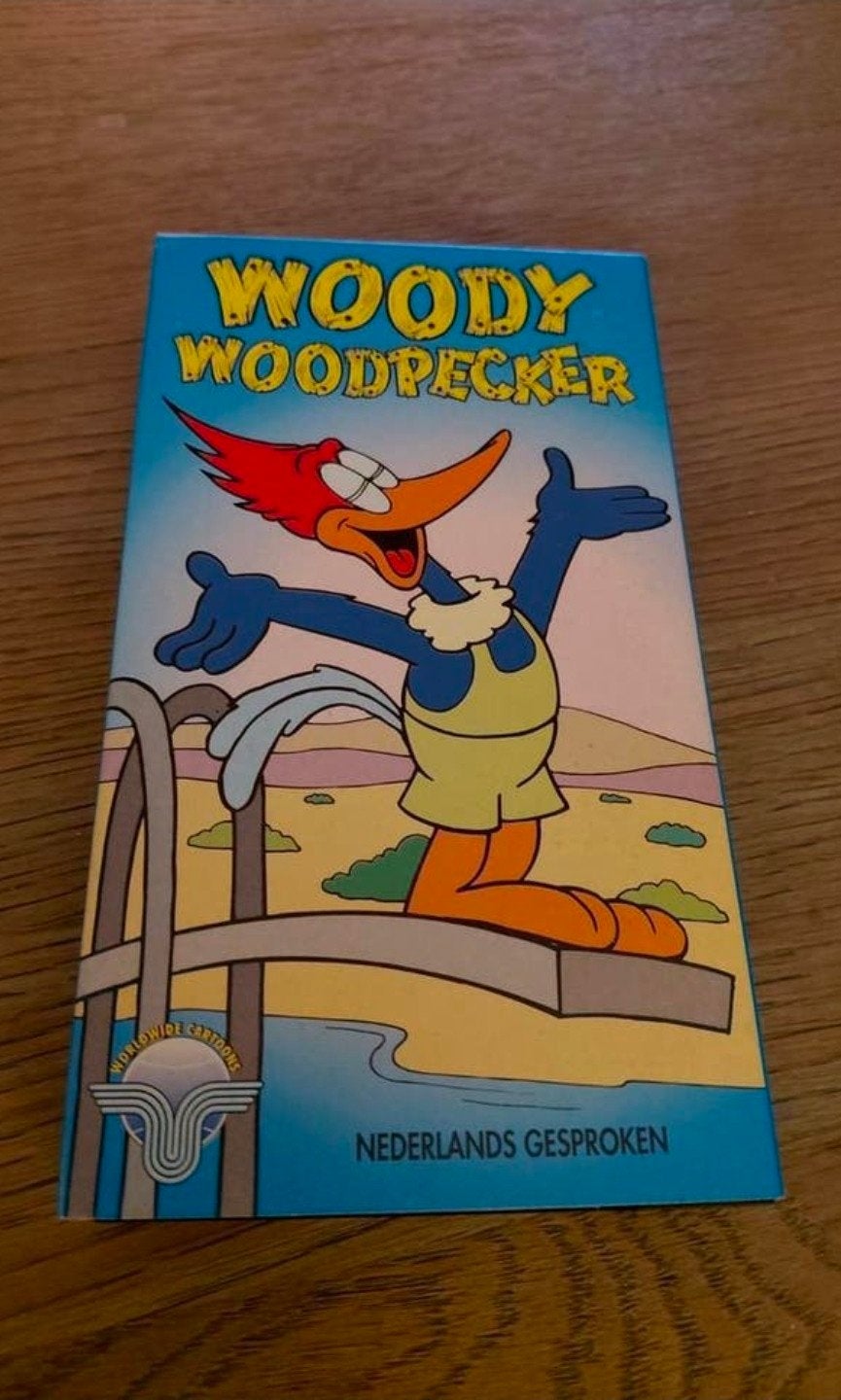 Woody Woodpecker videoband worldwide cartoons., Cd's en Dvd's, Gebruikt, Tekenfilm, Alle leeftijden, Ophalen of Verzenden
