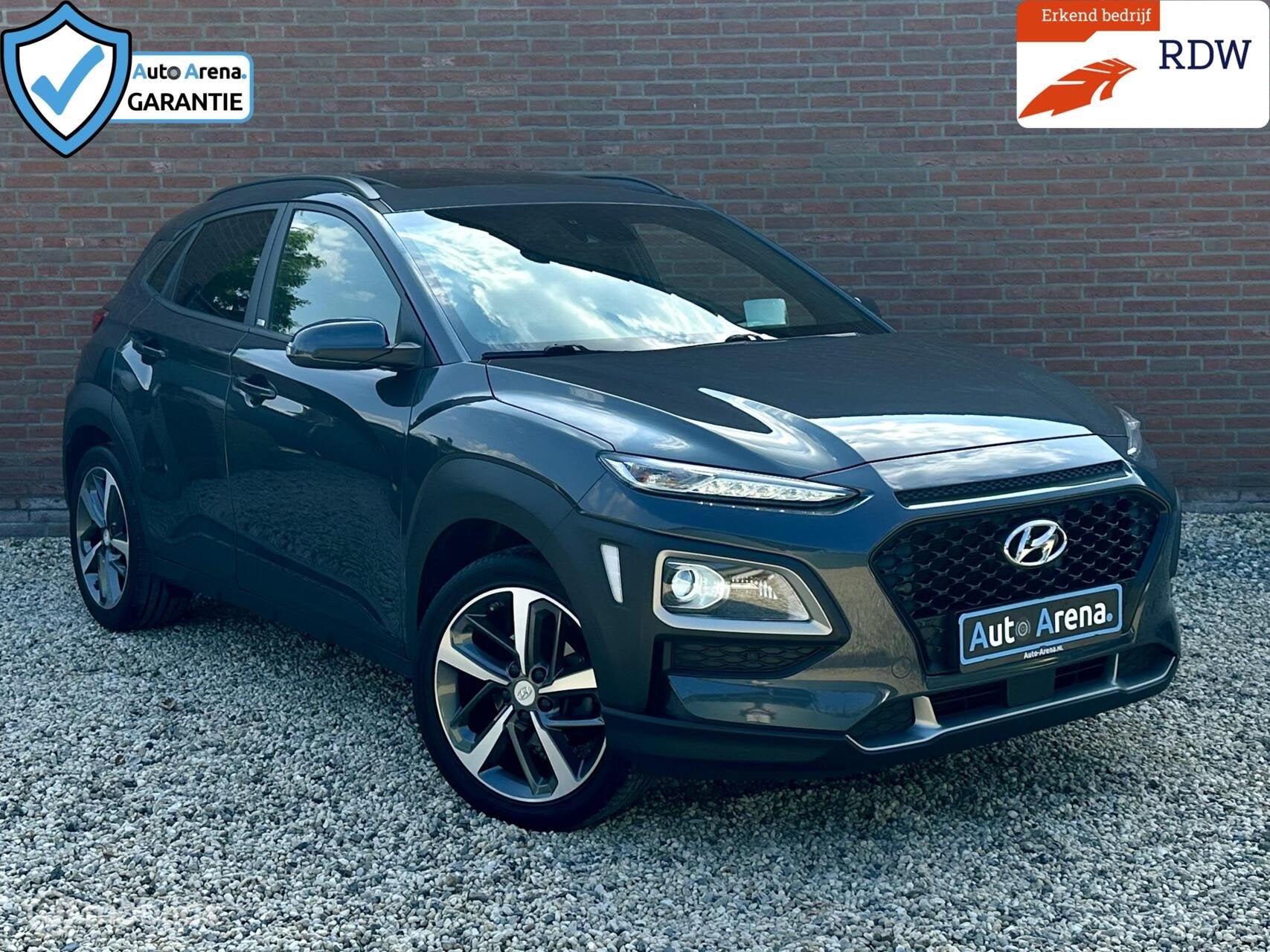 Hyundai Kona 1.0 T-GDI Premium 2WD | Stoelverw. | Stuurverw., Voorwielaandrijving, Gebruikt, Zwart, Leder en Stof