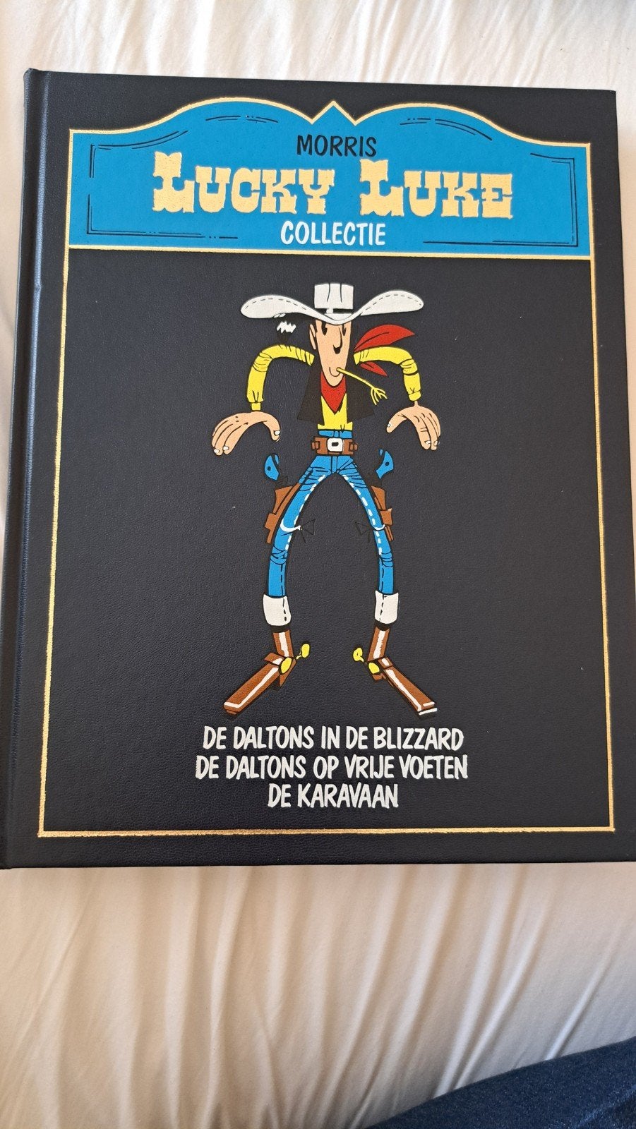 Lucky Luke Collectie nr 18 - De Daltons in de Blizzard, Eén stripboek, Ophalen of Verzenden, Zo goed als nieuw, Morris