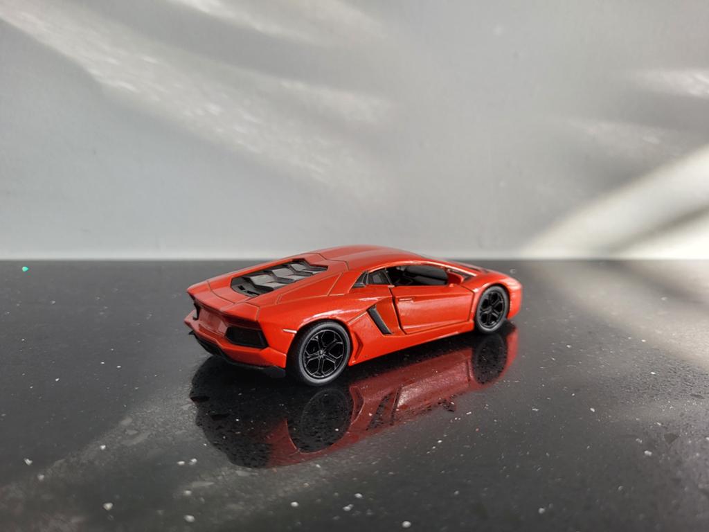 Lamborghini Aventador LP700-4 oranje 1/34 Welly, Hobby en Vrije tijd, Modelauto's | 1:43, Ophalen of Verzenden, Zo goed als nieuw