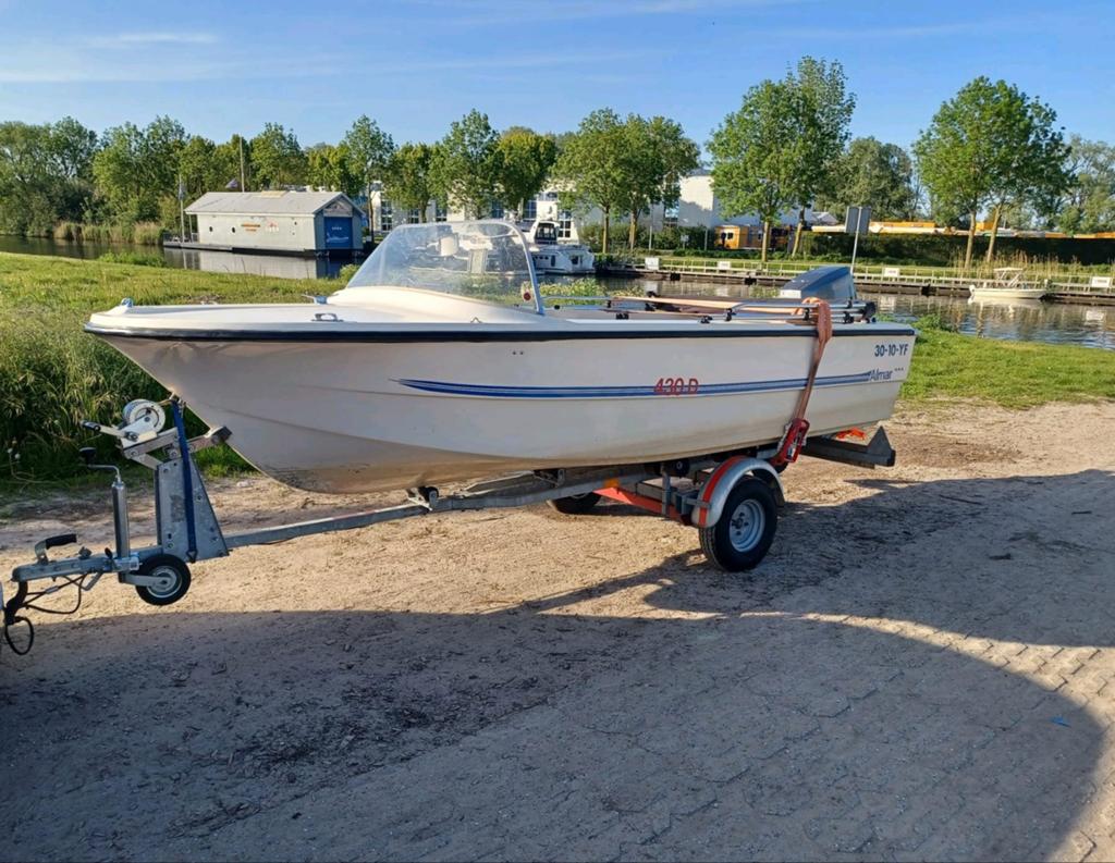 Mooie almar 430 motorboot 55pk met trailer, Ophalen, Biminitop
