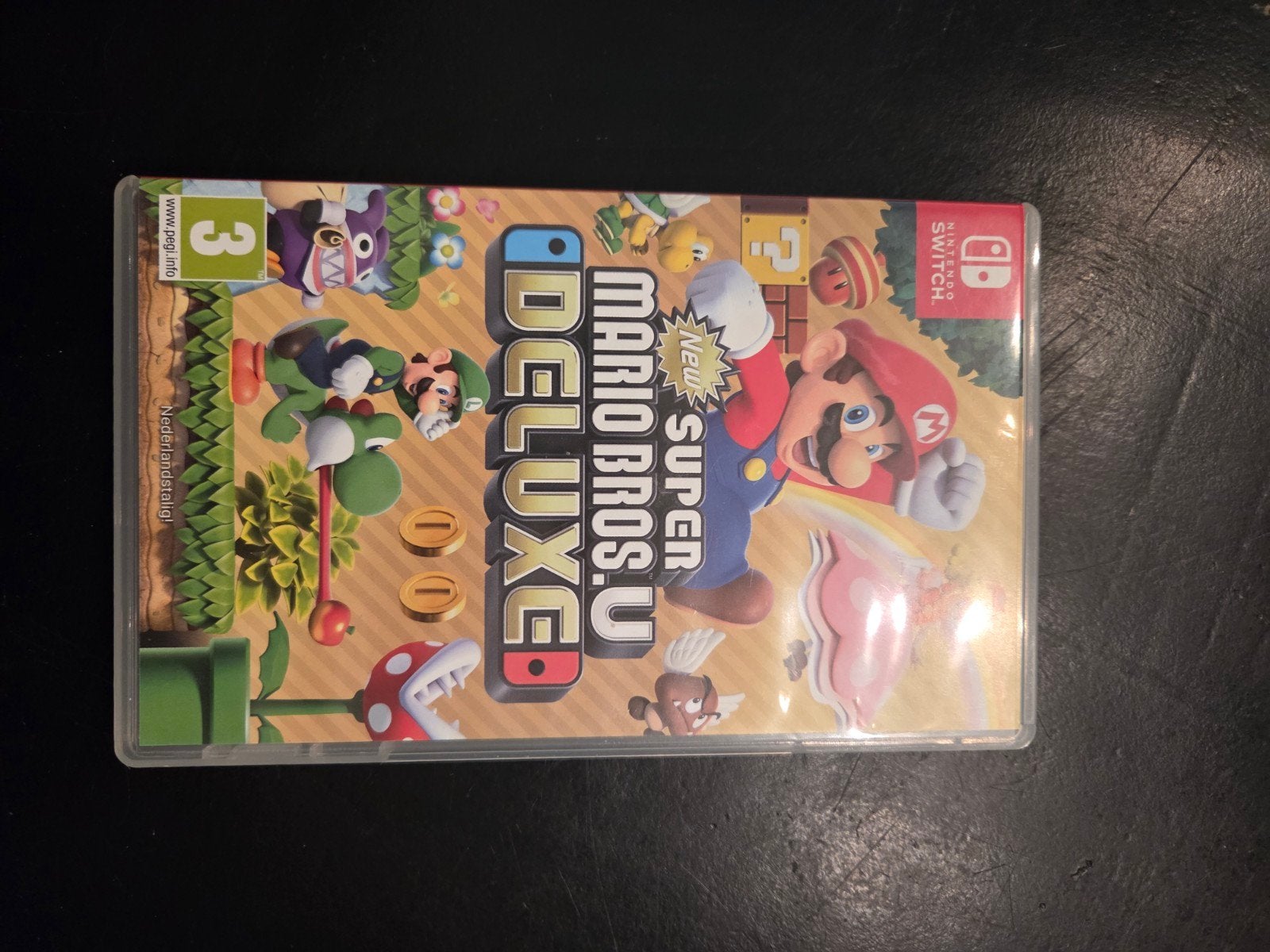 New Super Mario Bros. U Deluxe - Nintendo Switch, Spelcomputers en Games, Eén computer, Ophalen of Verzenden, Zo goed als nieuw
