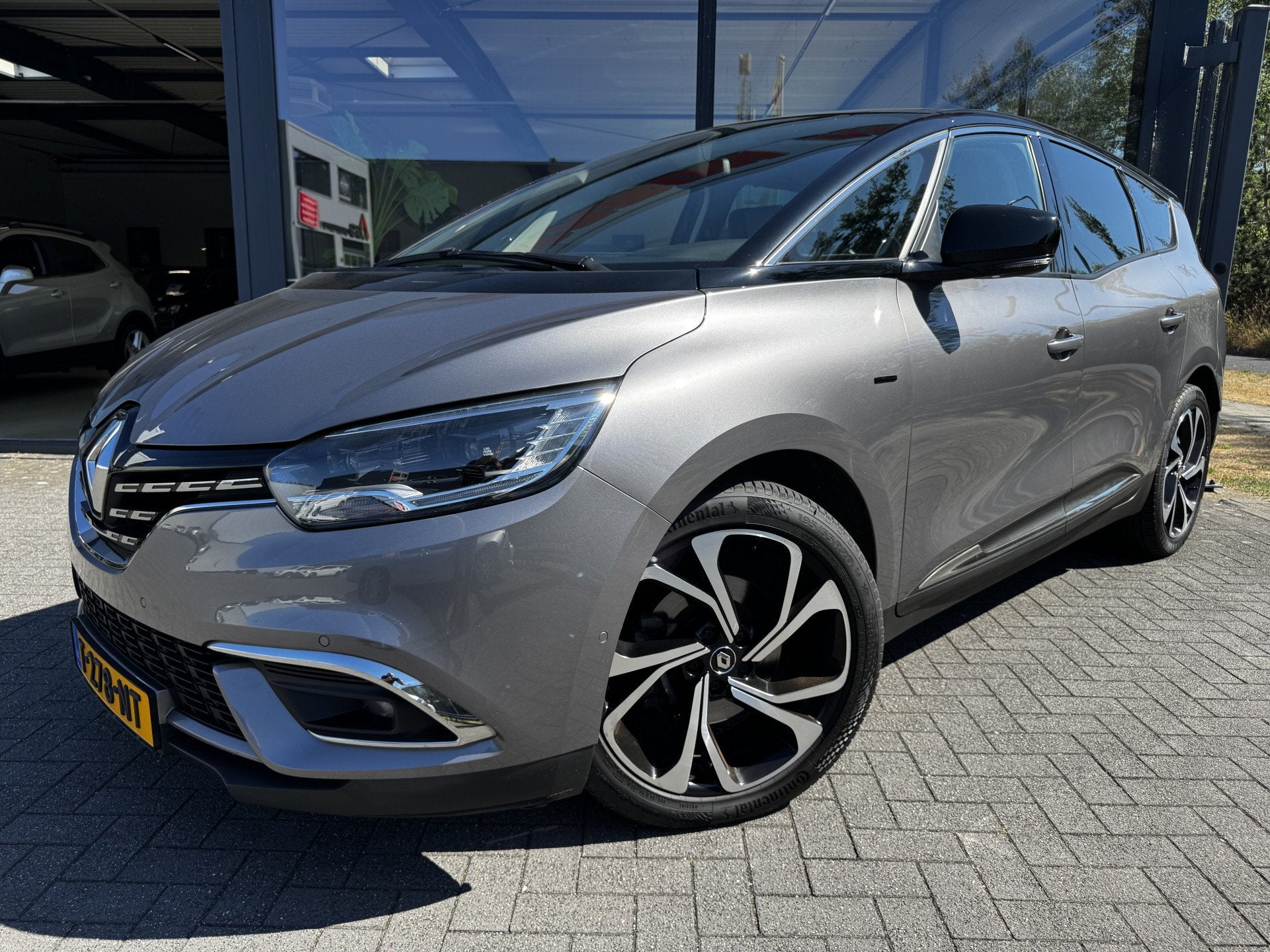 Renault Grand Scénic 1.3 TCe Intens 7 persoons Black Editio, Auto's, 12 maanden, 15 km/l, Euro 6, 4 cilinders