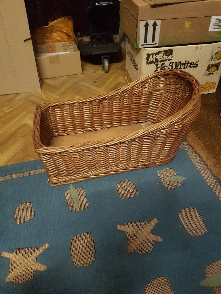 Rieten fietsmand voor klein hondje, Ophalen