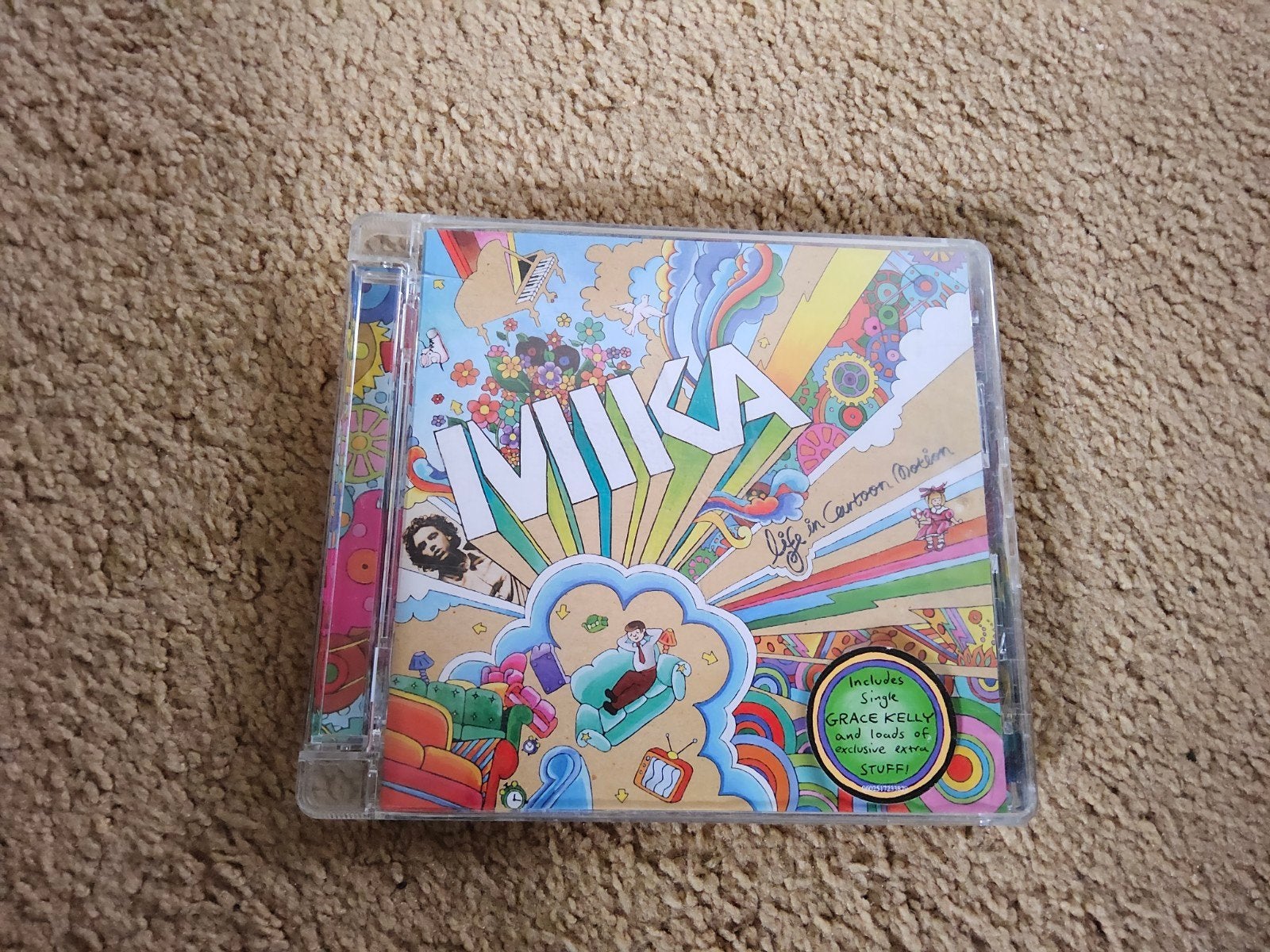 Mika - Life in Cartoon Motion CD (Pop, Album), Pop, Ophalen of Verzenden, Zo goed als nieuw, Inclusief boekje
