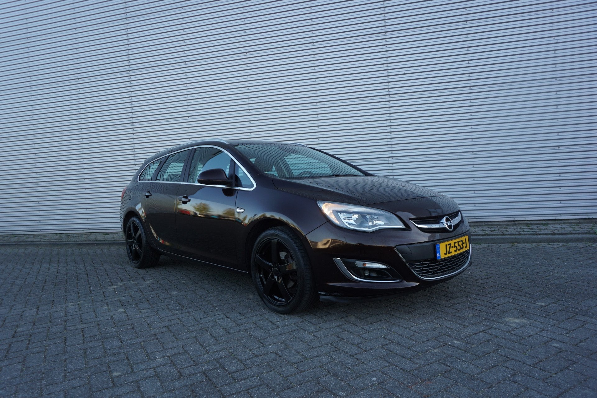 Opel Astra Sports Tourer 1.4 Turbo Sport + Climate / Navi /, Auto's, Opel, Voorwielaandrijving, Gebruikt, Euro 6, Leder en Stof