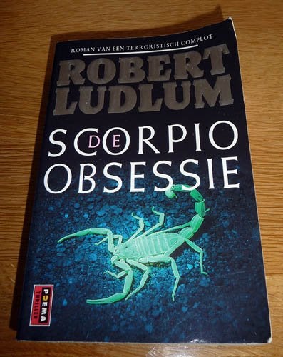 Boek LUDLUM - De Scorpio obsessie, Ophalen of Verzenden, Gelezen