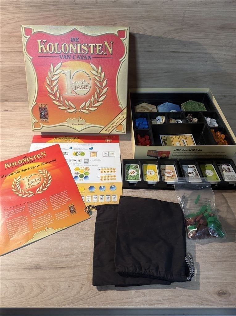 Kolonisten van catan 10 jaar editie hout - tot 6 spelers - s, Hobby en Vrije tijd, Verzenden, Zo goed als nieuw