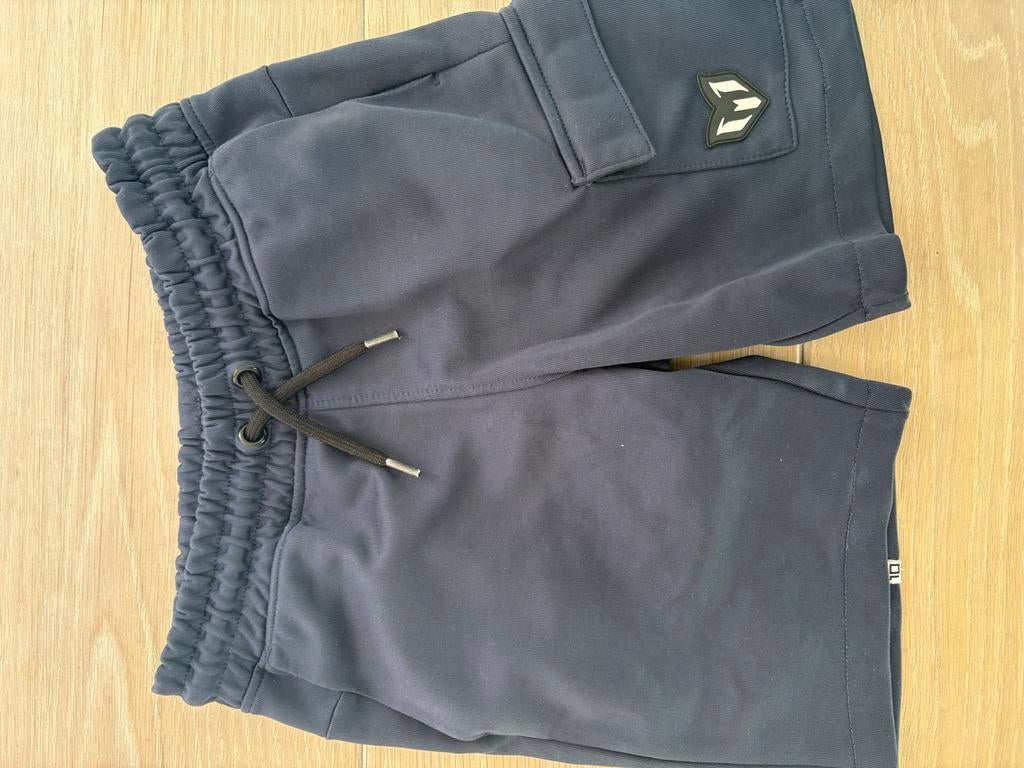 Donkerblauwe korte broek Vingino collab Messi maat 146/152, Ophalen of Verzenden, Gebruikt, Jongen