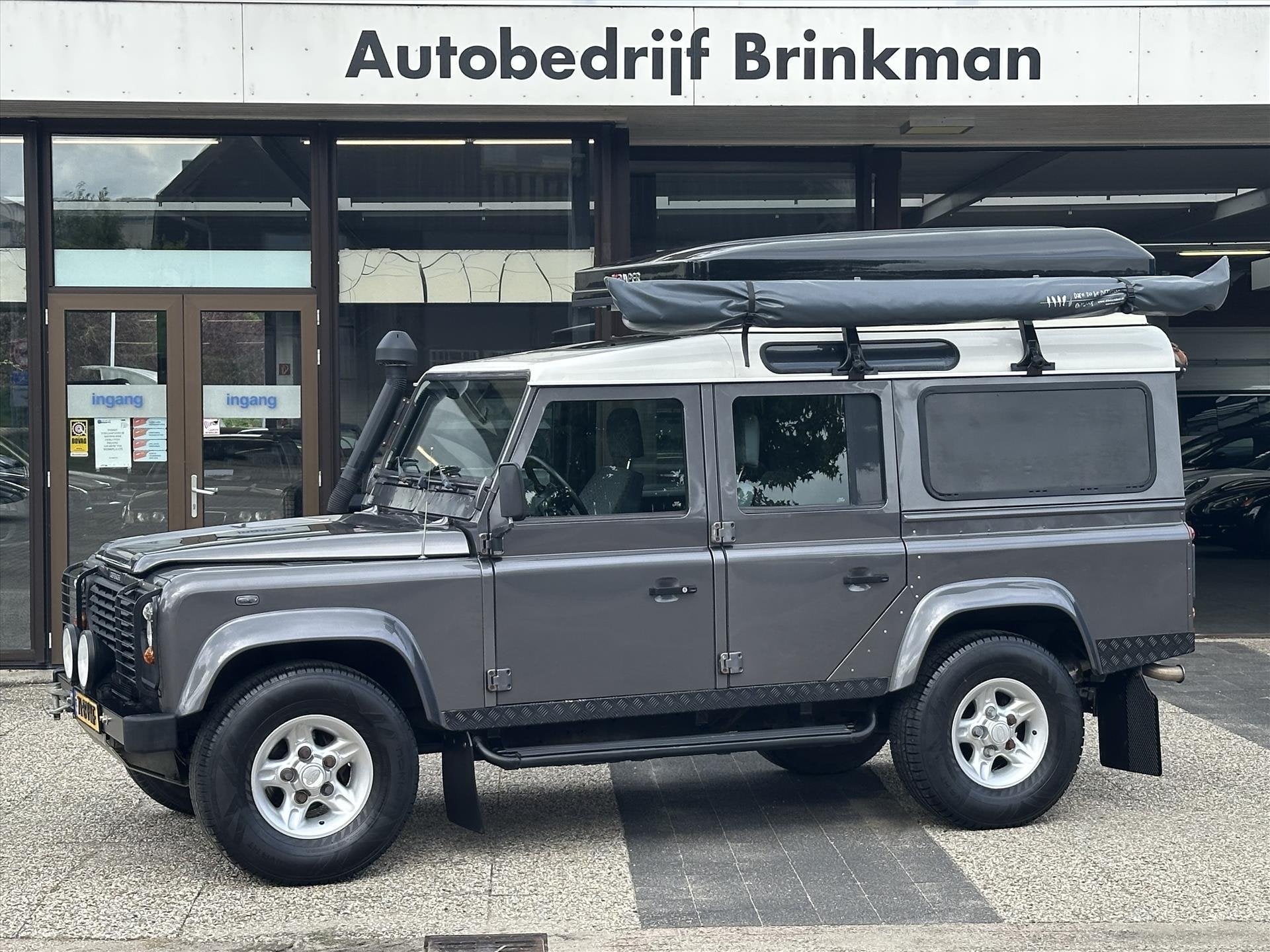 Land Rover Defender 110 TD5 ST WGN HR 4WD, Auto's, Dealer onderhouden, Stof, Gebruikt, Zwart