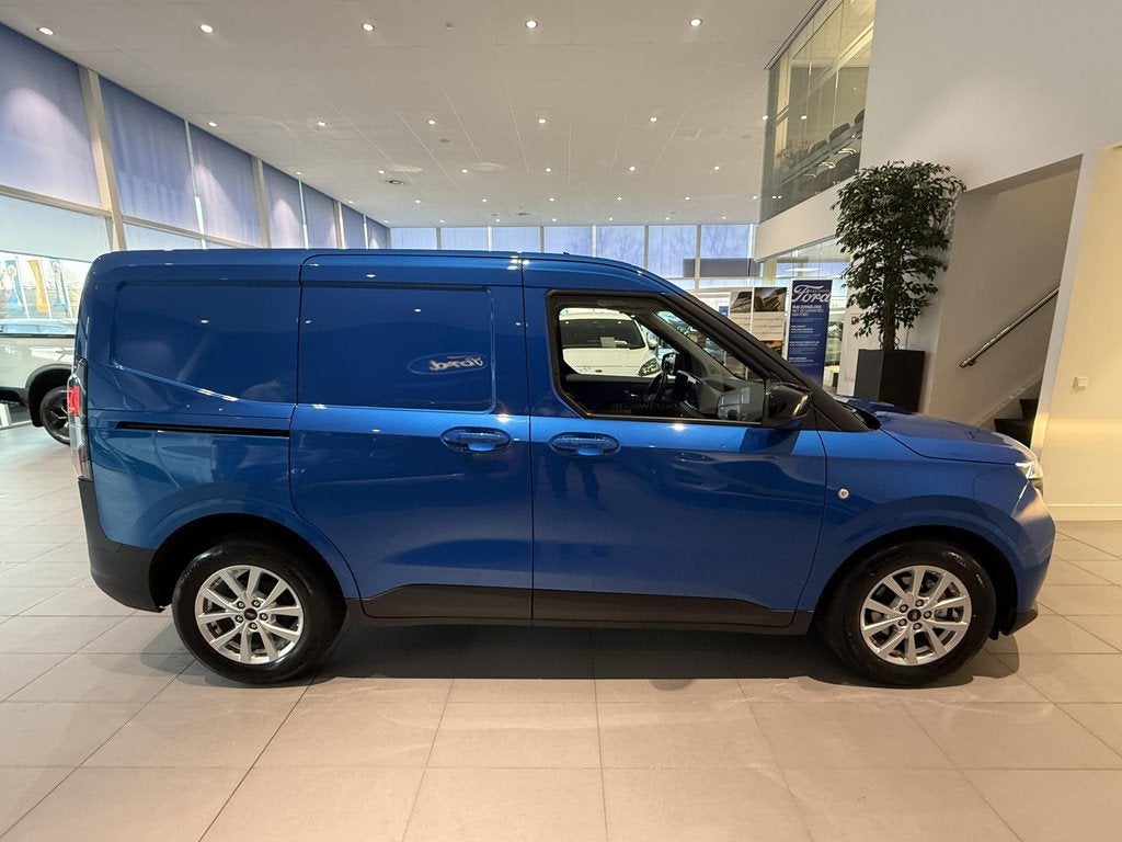 Ford Transit Courier 1.0 EcoBoost Limited Automaat | Navigat, Gebruikt, Met garantie (alle), Blauw, Bedrijf