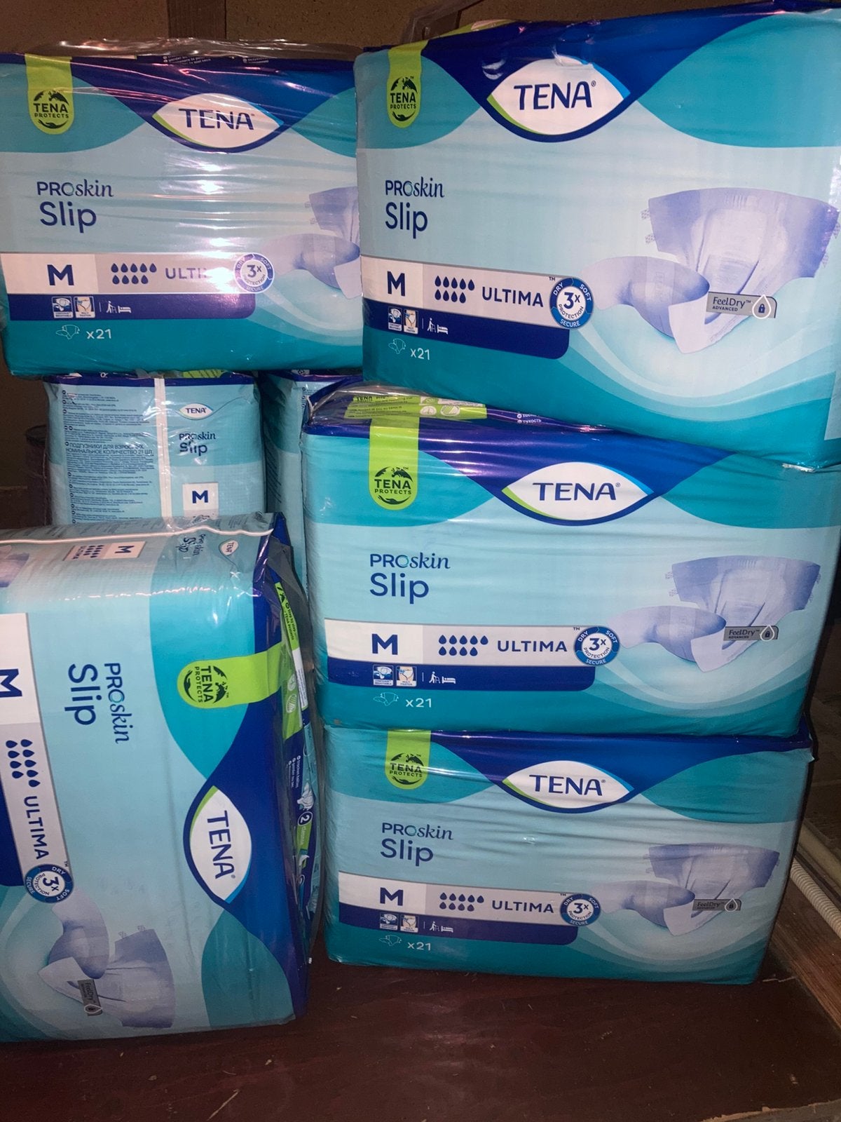 9 x Tena Proskin ultima luiers maat medium, Ophalen, Zo goed als nieuw