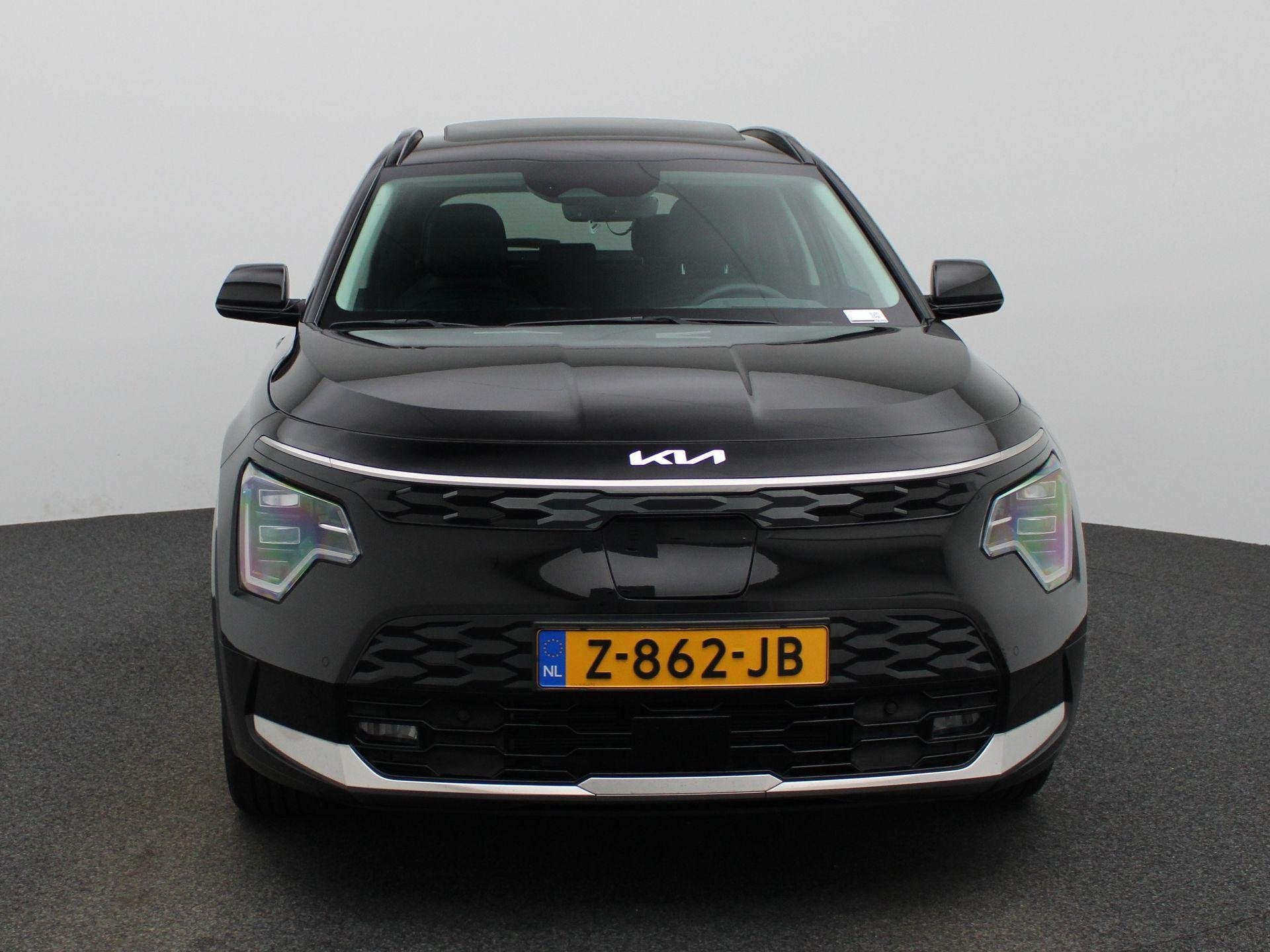 Kia Niro EV DynamicPlusLine 64.8 kWh | Clima | Opendak | Sto, Auto's, Gebruikt, 750 kg, 1657 kg, Zwart