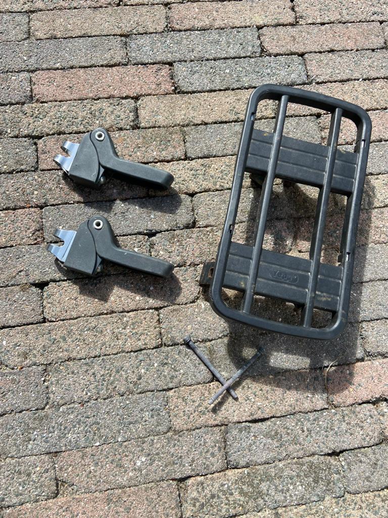 Bagage drager verlenger én voetensteunen, Ophalen
